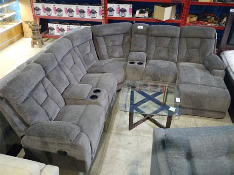 3 PIECE GREY RECLINING SECTIONAL WITH CONSOLES/CUP HOLDERS - Able Auctions