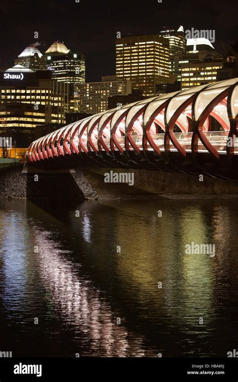 Peace bridge leading across the Bow River to downtown Calgary at night Stock Photo - Alamy