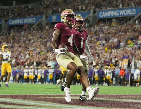 Keon Coleman shines in FSU debut with nine catches, 122 yards, and ...