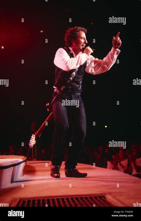 Bruce Springsteen performing at a concert in 1992, at the World Theatre ...