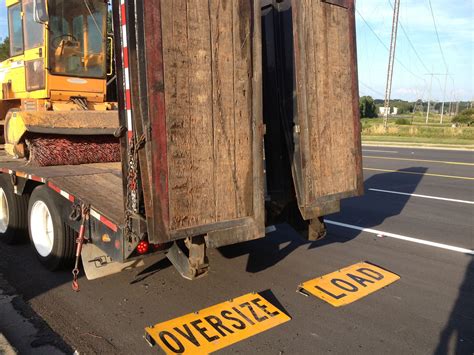 Equipment ramps on Lowboy trailer in 'UP' position. | Large cars ...