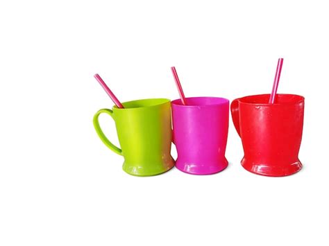 Premium Photo | Colorful plastic drinking glasses and drinking straws on white background Travel ...