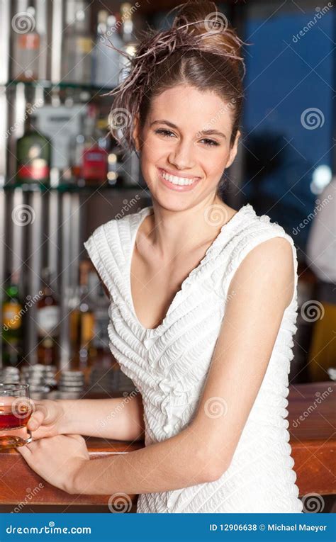 Young Woman with Hairstyle at Bar Smiling Stock Photo - Image of fashion, caucasian: 12906638