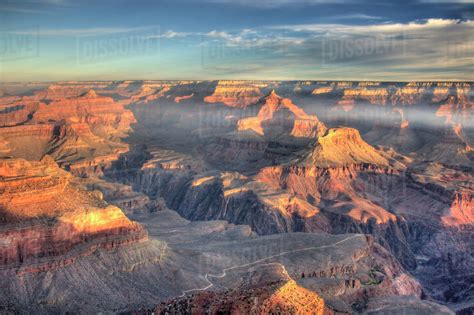 AZ, Arizona, Grand Canyon National Park, South Rim, sunrise at Yavapai Point, with view of ...