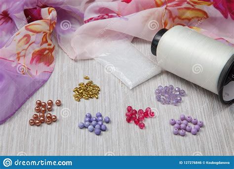 Stringing beads stock photo. Image of making, green - 127276846