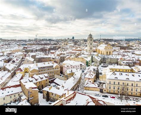 Beautiful Vilnius city panorama in winter with snow covered houses ...