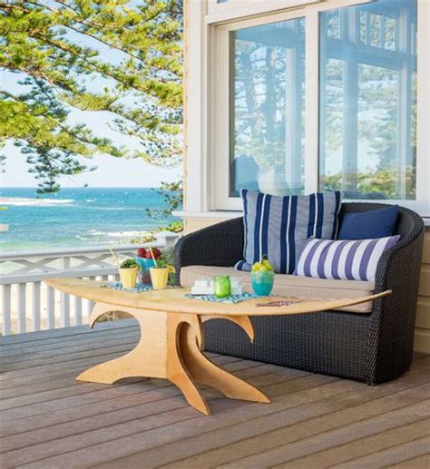 Surfboard table For a laid-back beachy look, these classic boards are gold – simply add a p ...