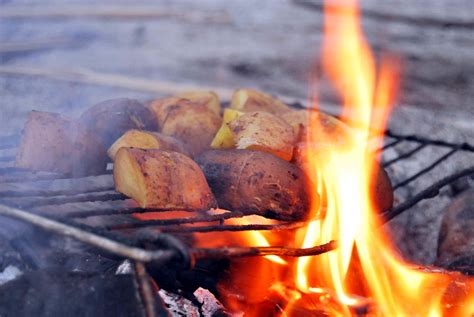 sweet potatoes roasting on an open fire | Ironchefbalara | Flickr