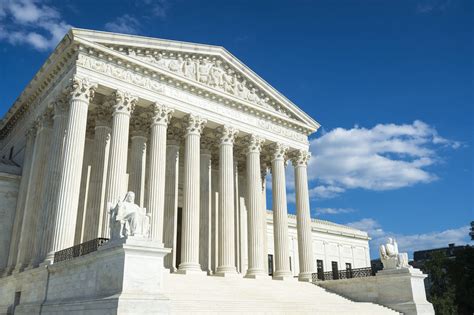 Supreme Court of the United States building front entrance with a ...