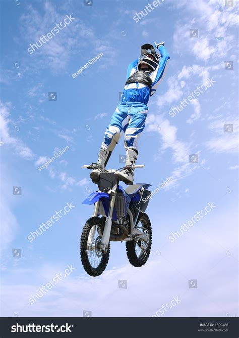 A Stunt Rider Doing Tricks On His Dirt Bike Stock Photo 1599488 : Shutterstock