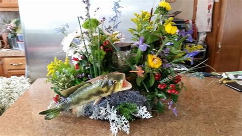 Sympathy fishing themed arrangement by Mari Lynne Katsma, for floral ...