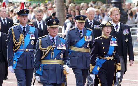 The King (Charles III) in RAF uniform walks with his family during the ...