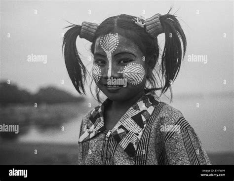 Cute Girl With Thanaka On Cheeks, Yangon, Myanmar Stock Photo - Alamy