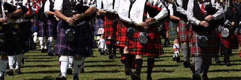 Stirling Highland Games - caber tossing in a beautiful setting