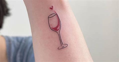 Fine line wine glass tattoo