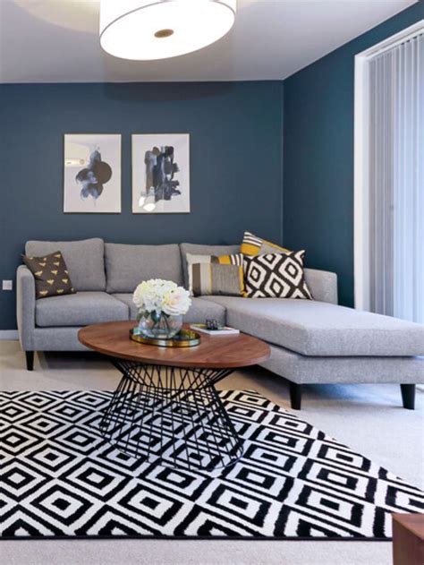 Grey fabric corner sofa and patterned accessories – Artofit