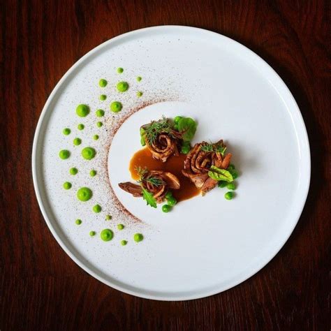 Lamb shoulder, black garlic powder, peas and jus 🍖🍴 by Michelle Tran ...