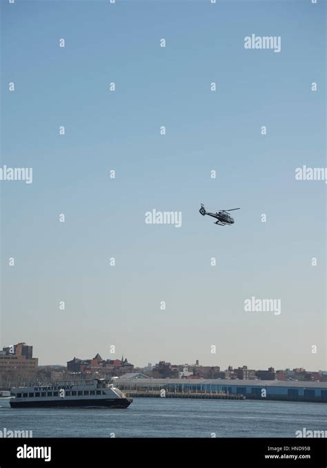 Statue of liberty Tour helicopter taking off in new york Stock Photo ...