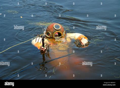 Tarpon Springs Florida sponge diving demonstration diver floating on ...