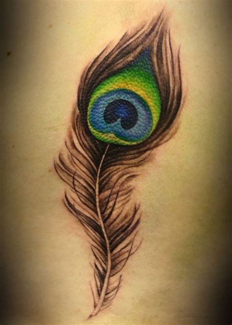 The 25+ best Peacock feather tattoo meaning ideas on Pinterest ...