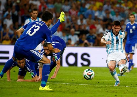 Argentina's Lionel Messi scores a goal during the 2014 World Cup Group F soccer match against ...