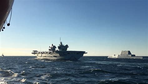 HMS Queen Elizabeth meets up with Zumwalt class destroyer USS Michael Monsoor