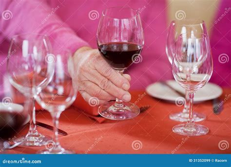 Senior Man S Hand Holding Wine Glass at Restaurant Table Stock Image - Image of cloth, celebrate ...