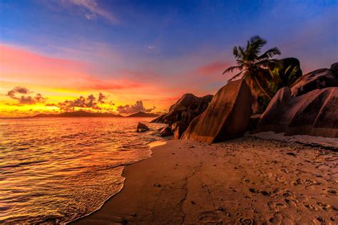 Anse Source of Silver Beach at sunset in Seychelles - Photographic print for sale