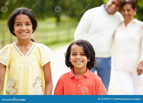 Indian Grandparents And Grandchildren Walking In Countryside Stock Photography - Image: 33709212