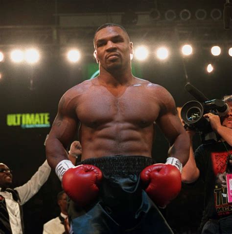 Mike Tyson's physique in his first fight out of prison against Peter ...