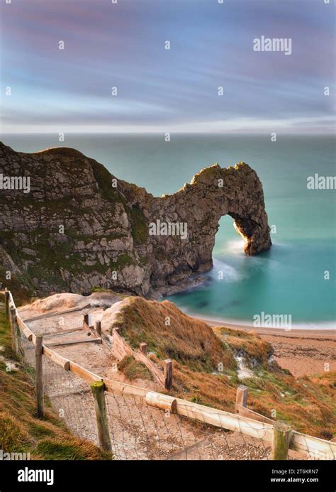 Durdle Door in Dorset at sunrise Stock Photo - Alamy