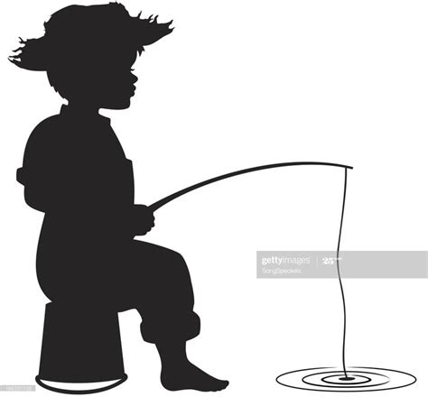 Silhouette of little boy wearing a straw hat and sitting on a bucket ...