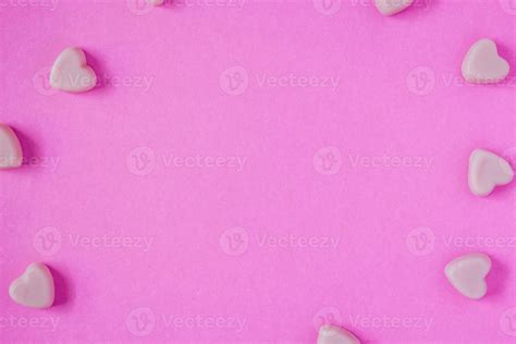 valentine candy hearts shape on pink background 11828043 Stock Photo at Vecteezy