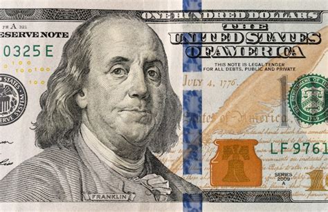 Premium Photo | 100 dollars bill and portrait benjamin franklin on usa money banknote