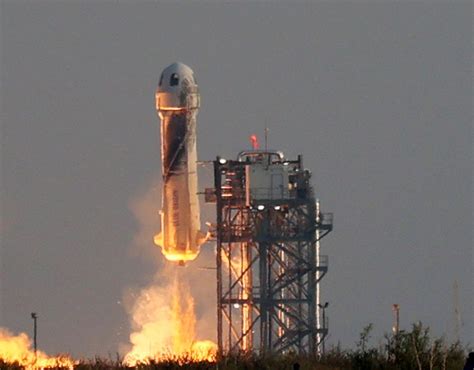 Blue Origin successfully sends Jeff Bezos and three others to space and ...