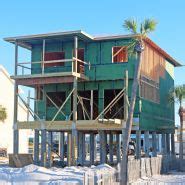 Acorn Construction - Modern coastal piling home on Navarre Beach