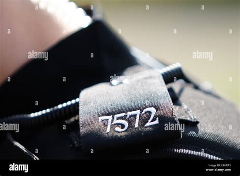 Police epaulettes forming part of the Thames Valley Police uniform Stock Photo - Alamy