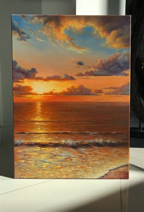 a painting of a sunset over the ocean