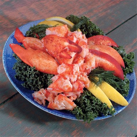 Canned Lobster Meat on Blue Plate with Lemon Slices - Prepared Food ...