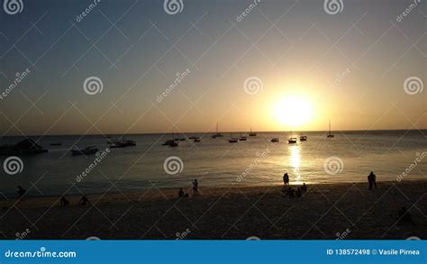 Zanzibar beach at sunset stock photo. Image of flooating - 138572498