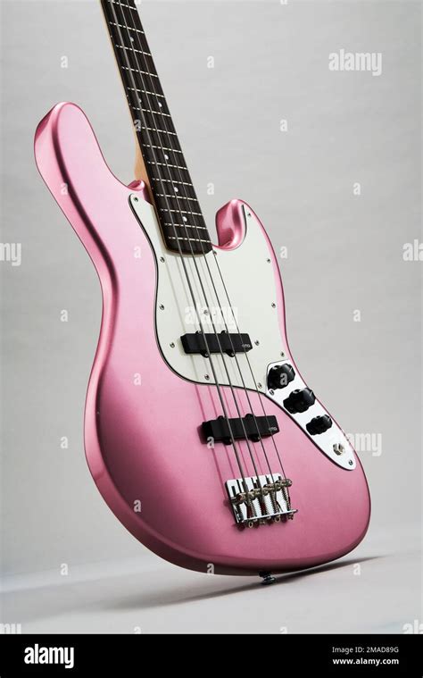 Bass Collection Betsy Guy Pratt bass guitar in pink finish Stock Photo - Alamy