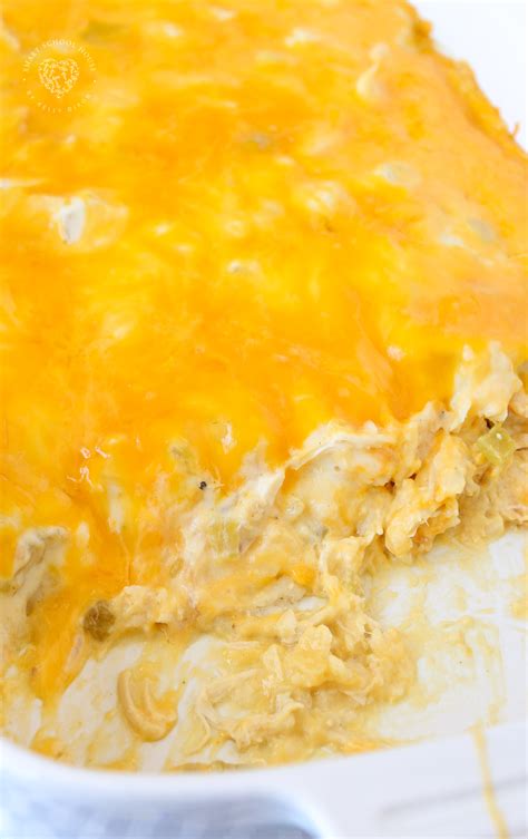 Sour Cream Chicken Enchilada Casserole - SO CHEESY!