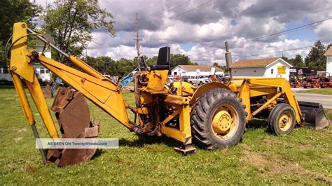 Massey ferguson gc1715 backhoe attachment