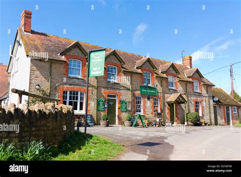 The Three Horseshoes Inn at Powerstock Dorset England UK Stock Photo - Alamy