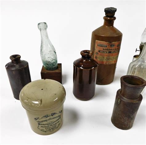 Victorian glass bottles, storage jars including Stephens blue black writing fluid and Tuxford ...