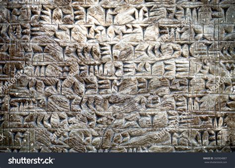 Ancient Assyrian Wall Carvings Of Cuneiform Writing Stock Photo ...