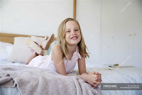 Little Girl Lying Bed Stock