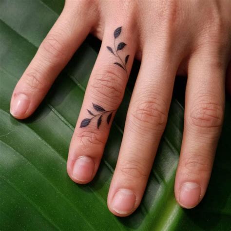 40 Tiny Finger Tattoos That Define Perfection - TattooBlend