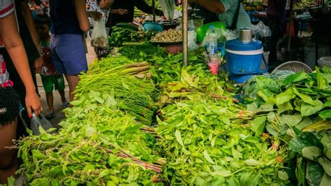 Vender Selling Variety of Foods and Fresh Vegetables Local Market ...