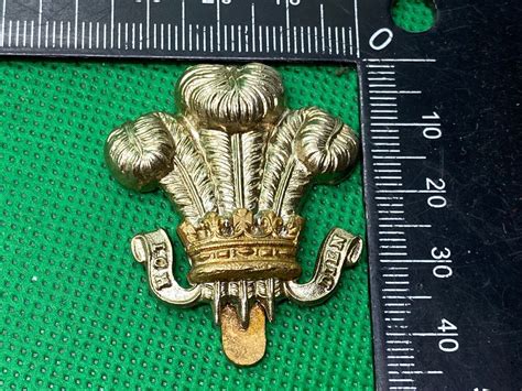 WW1 / WW2 British Army - Regiment of Wales Cap Badge - Maker Marked – The Militaria Shop